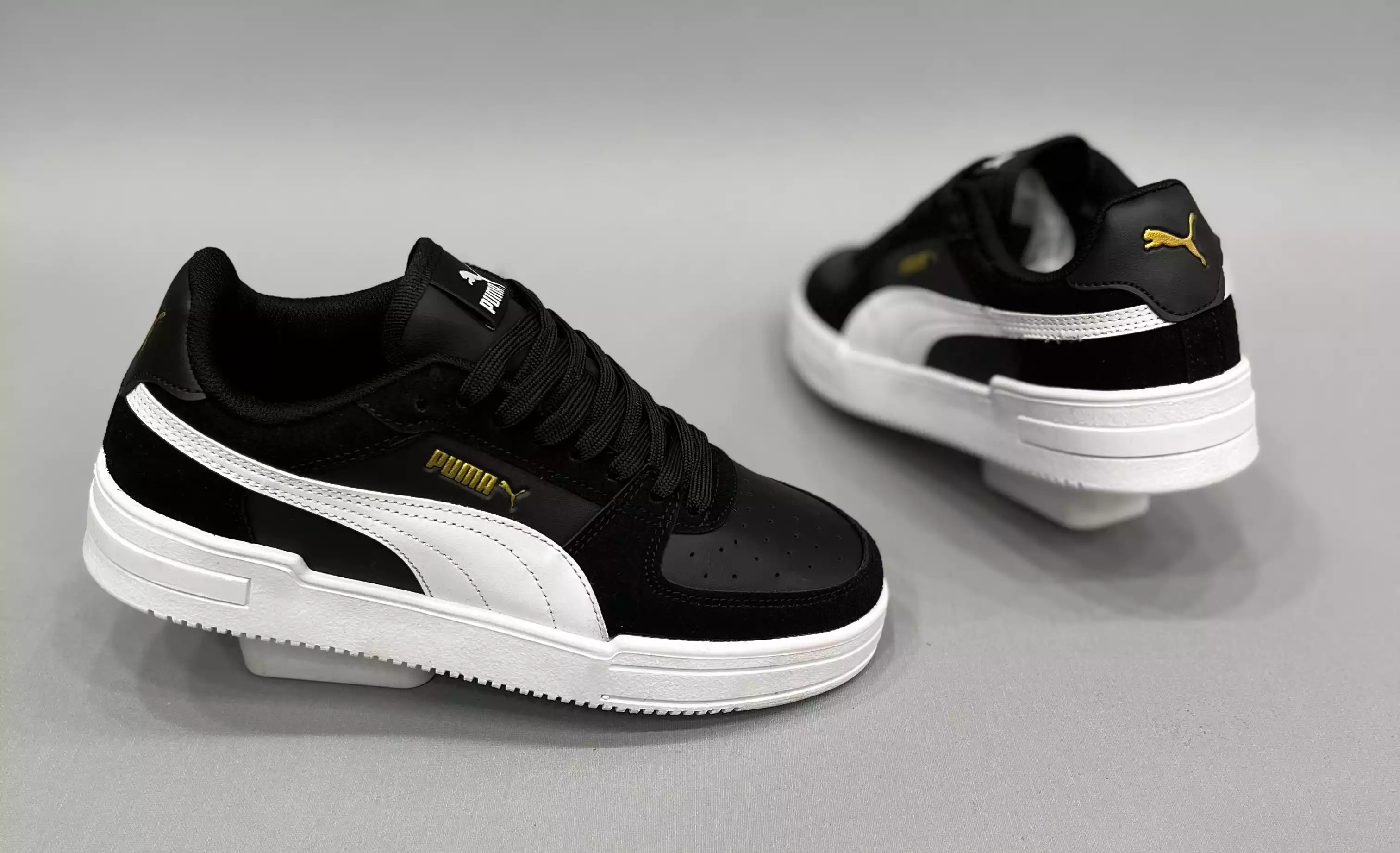 PUMA SİYAH BEYAZ KADIN SPOR AYAKKABI